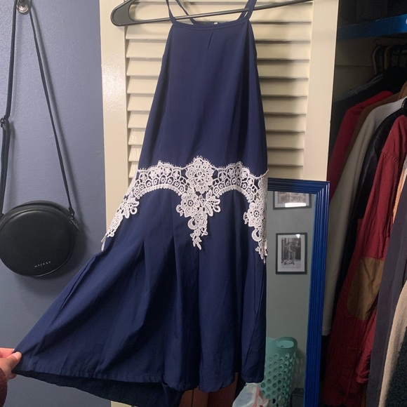 Navy romper with open sides and lace midriff - Picture 6 of 6